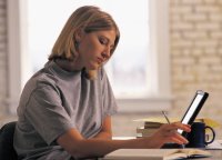 Student Studying with Her Laptop